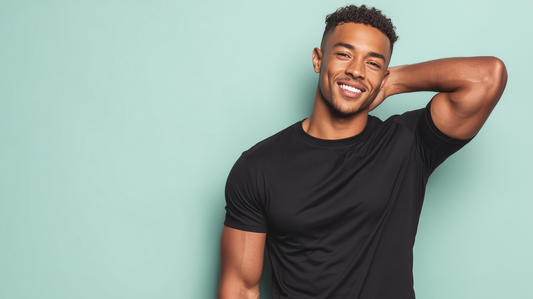 Smiling man on a mint-green background